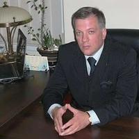Адвокат  Тризна Александр Александрович