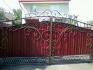 Художня ковка - ворота, паркани, решітки, козирки, двері, балкони. логотип